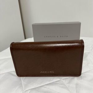 Charles & Keith timeless clutch/ cross body chain bag. Cones with dust bag& box.